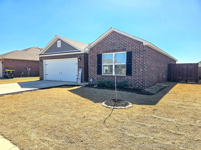 ranch-style home featuring brick siding, an attached garage, concrete driveway, and a front lawn