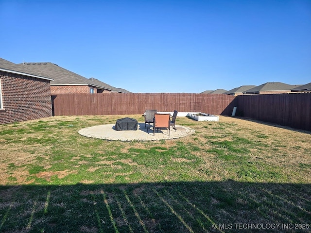 view of yard with a patio and a fenced backyard