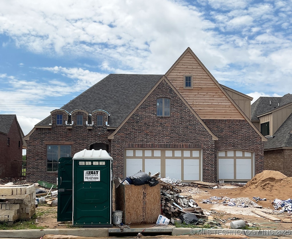 2705 W Twin Oaks St, Broken Arrow, OK 74012 - view of front of home with brick siding and a shingled roof