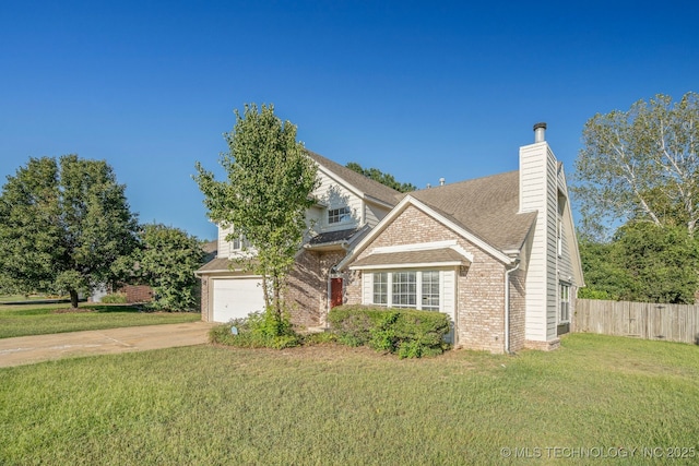 view of front of property featuring a front yard, fence, driveway, a garage, and brick siding