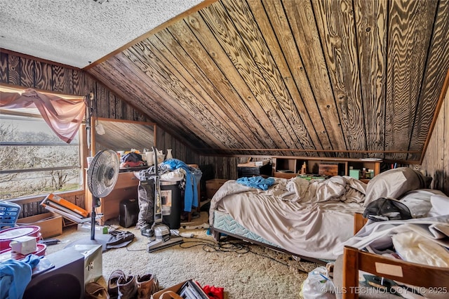 20480 Burneyville, Burneyville, OK 73430 - bedroom with lofted ceiling, a textured ceiling, and wood walls