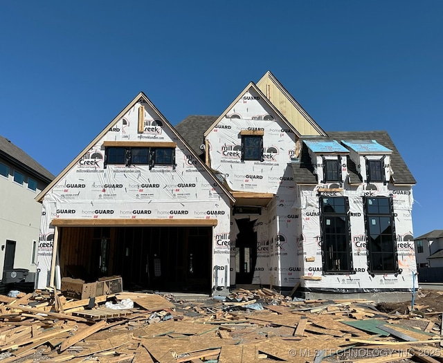 property under construction featuring a garage