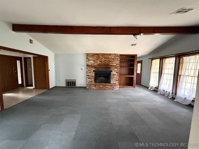 unfurnished living room featuring visible vents, vaulted ceiling with beams, and carpet