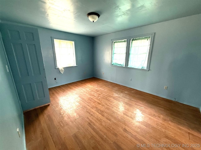 empty room with light wood-style floors