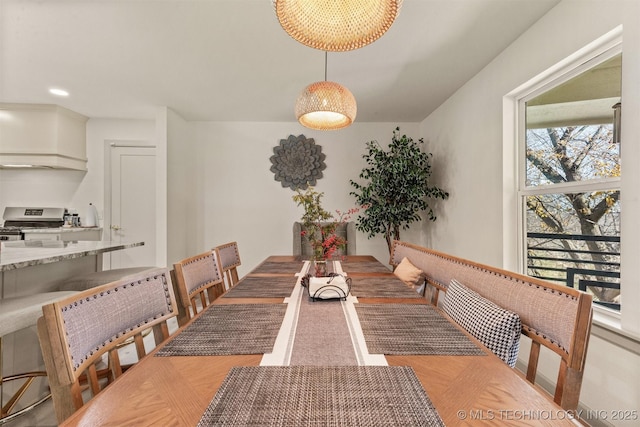 dining space with recessed lighting