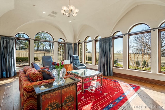 3217 E 61st Pl, Tulsa, OK 74136 - sunroom with a notable chandelier, a wealth of natural light, and visible vents
