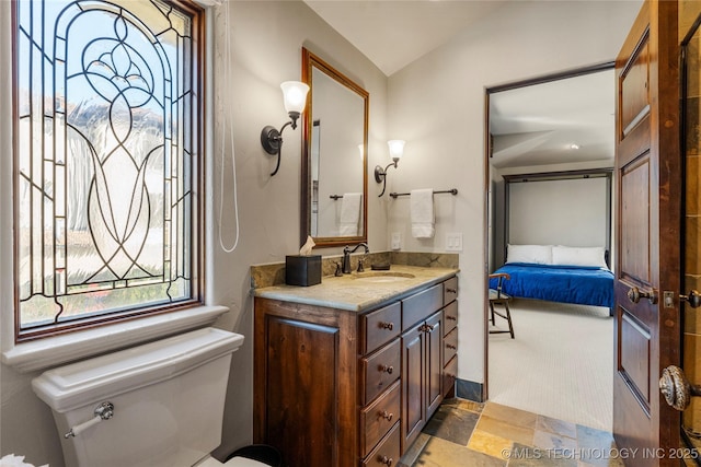 3217 E 61st Pl, Tulsa, OK 74136 - ensuite bathroom with toilet, connected bathroom, and vanity