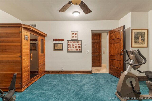 3217 E 61st Pl, Tulsa, OK 74136 - workout area with visible vents, ceiling fan, carpet flooring, and baseboards