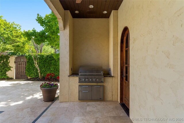 3217 E 61st Pl, Tulsa, OK 74136 - view of patio featuring a gate and area for grilling
