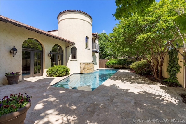 3217 E 61st Pl, Tulsa, OK 74136 - view of swimming pool with a patio, french doors, a fenced backyard, and a fenced in pool