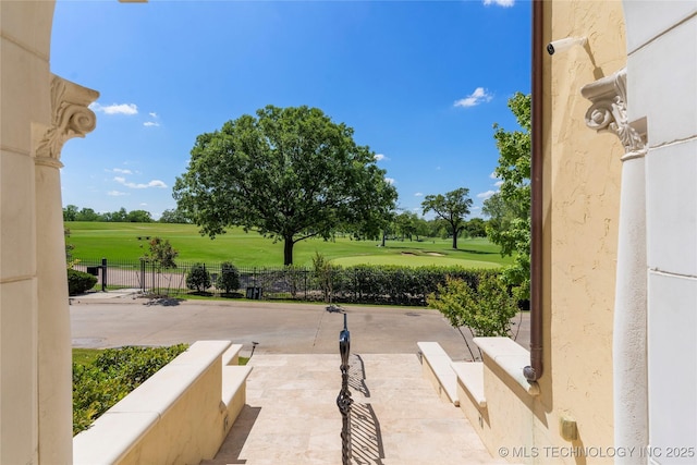 3217 E 61st Pl, Tulsa, OK 74136 - view of patio / terrace featuring fence and view of golf course