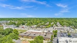 bird's eye view with a view of trees