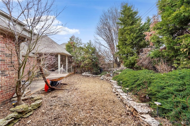 view of yard with a patio and fence