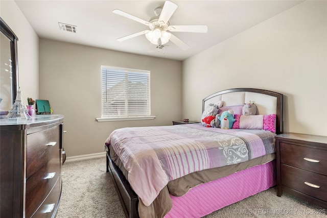 bedroom with a ceiling fan, baseboards, visible vents, and light carpet