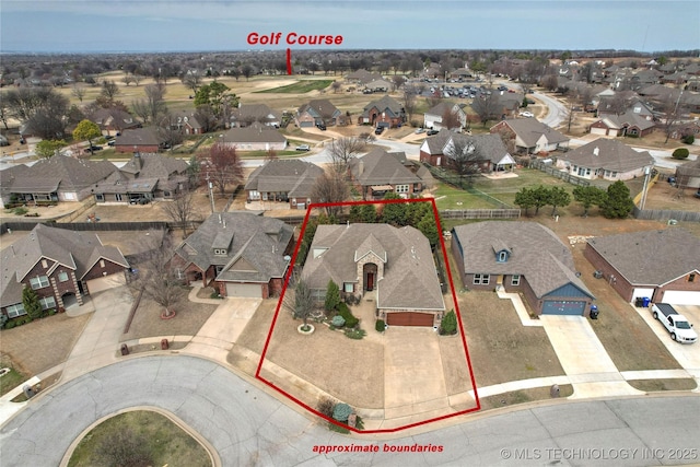 birds eye view of property with a residential view