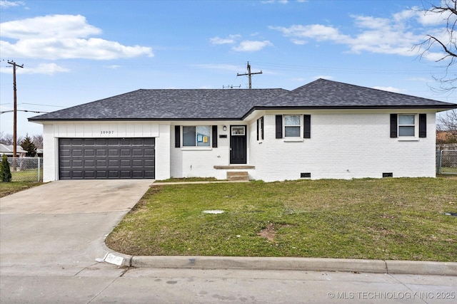 ranch-style house with brick siding, a shingled roof, fence, a front yard, and crawl space