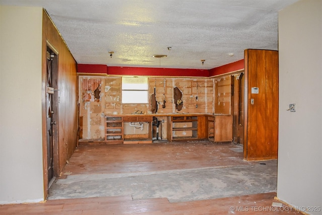 interior space featuring a textured ceiling