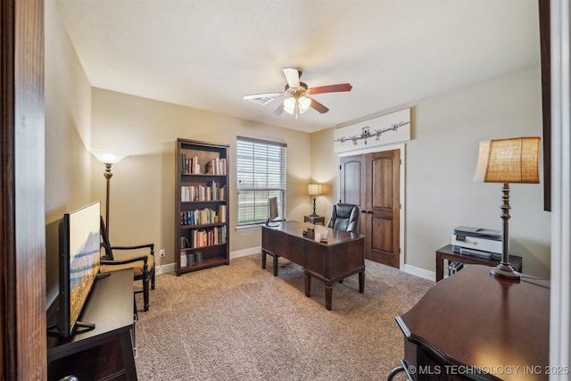 office with baseboards, carpet floors, and ceiling fan