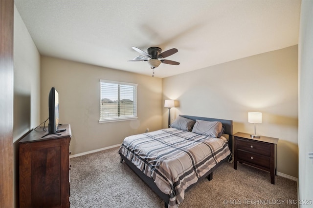 bedroom with carpet, baseboards, and ceiling fan