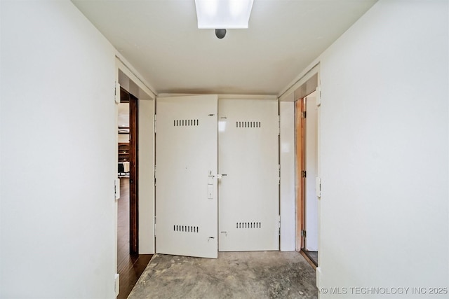 2365 Deer Run, Chouteau, OK 74337 - corridor featuring unfinished concrete flooring