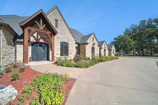 2365 Deer Run, Chouteau, OK 74337 - view of front of home with stone siding