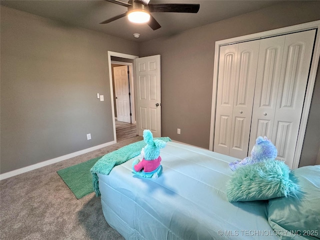 bedroom featuring baseboards, a closet, carpet floors, and ceiling fan