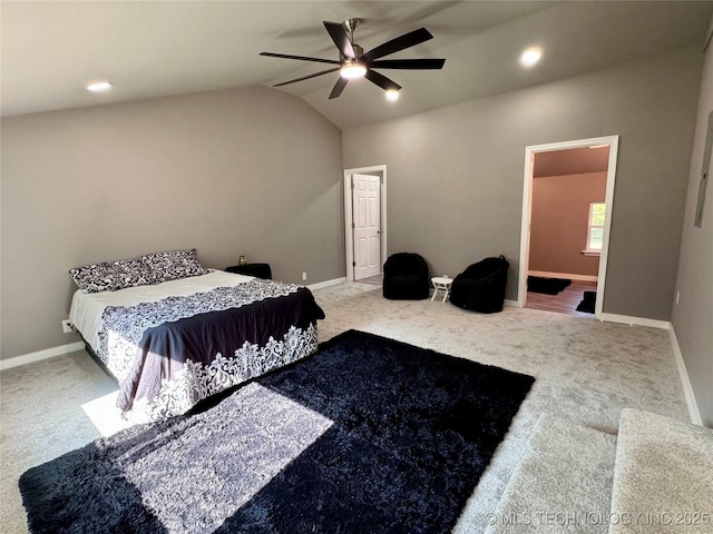 carpeted bedroom with baseboards, lofted ceiling, and ceiling fan