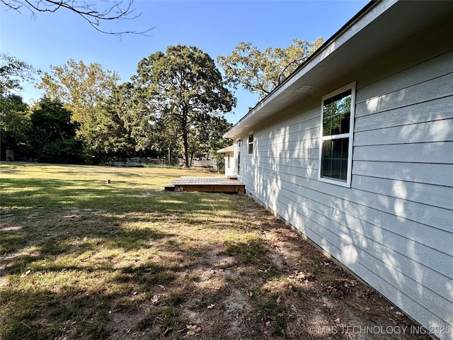 view of yard with a deck