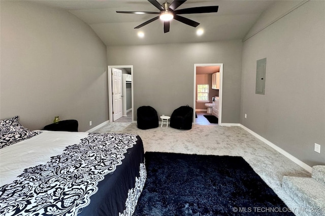 bedroom with connected bathroom, baseboards, carpet, lofted ceiling, and electric panel