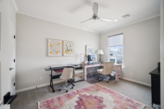 carpeted office with visible vents, ceiling fan, baseboards, and ornamental molding