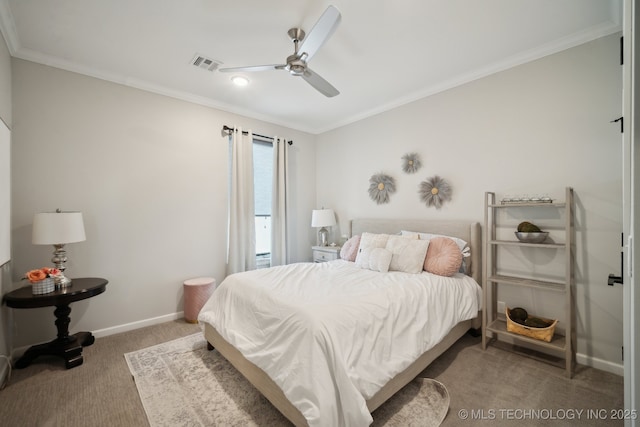 carpeted bedroom with visible vents, a ceiling fan, crown molding, and baseboards