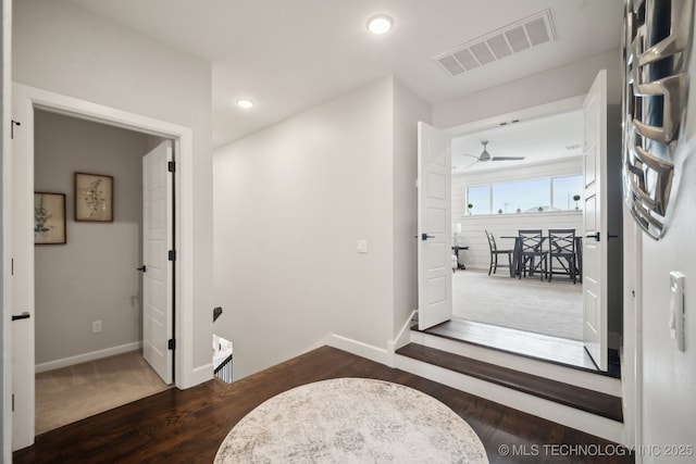 interior space featuring visible vents, wood finished floors, recessed lighting, baseboards, and ceiling fan