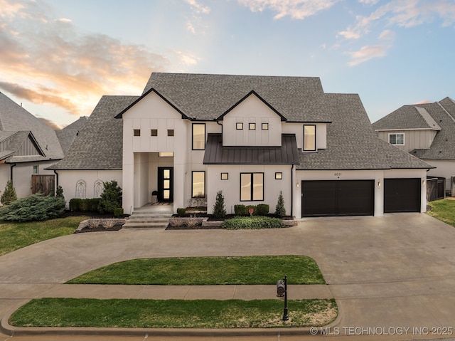 modern inspired farmhouse featuring a standing seam roof, metal roof, and roof with shingles