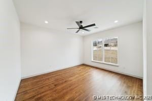 unfurnished room with recessed lighting, wood finished floors, and ceiling fan