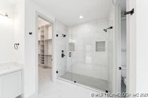 full bathroom featuring vanity and a stall shower