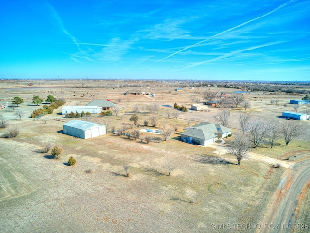 drone / aerial view with a rural view and a desert view