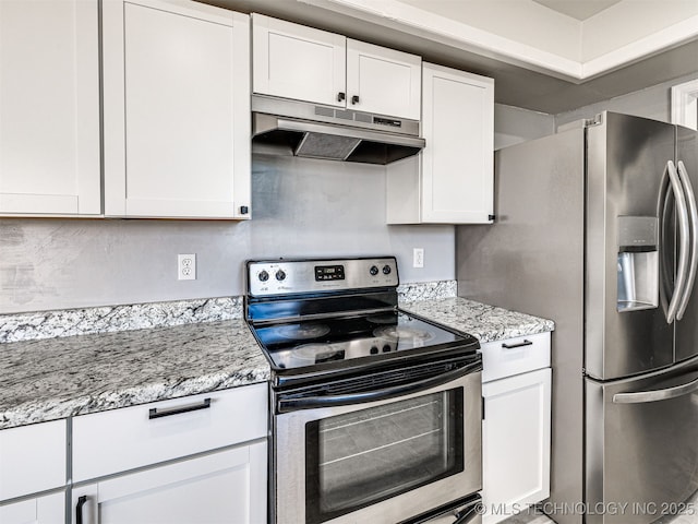 kitchen featuring under cabinet range hood, white cabinets, appliances with stainless steel finishes, and light stone countertops