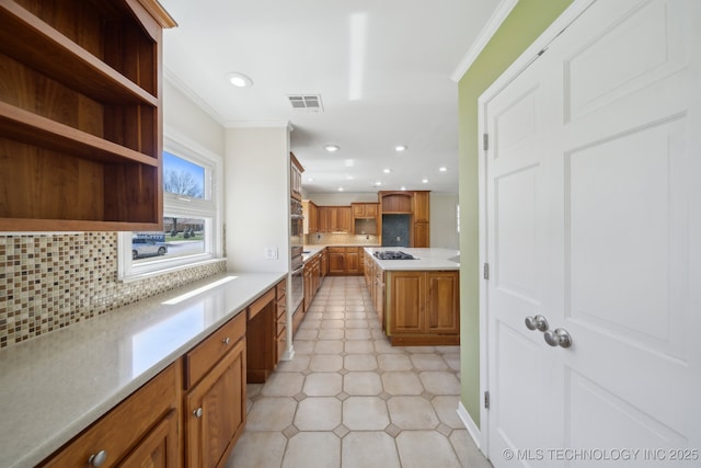 kitchen featuring visible vents, open shelves, gas cooktop, brown cabinetry, and crown molding