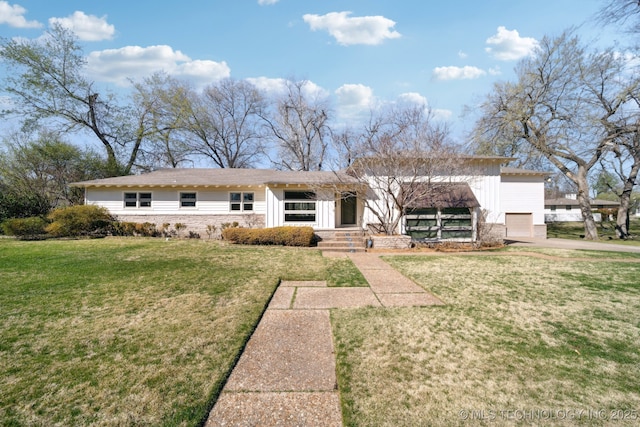 view of front of property featuring board and batten siding and a front lawn