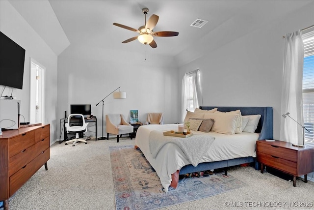 bedroom with visible vents, ceiling fan, and carpet floors