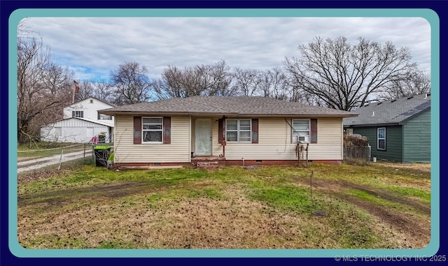 view of front of home with a front lawn, fence, roof with shingles, cooling unit, and crawl space