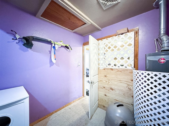 bathroom featuring tile patterned floors, visible vents, toilet, and baseboards