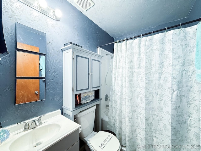 full bath with visible vents, toilet, a textured wall, vanity, and shower / bathtub combination with curtain