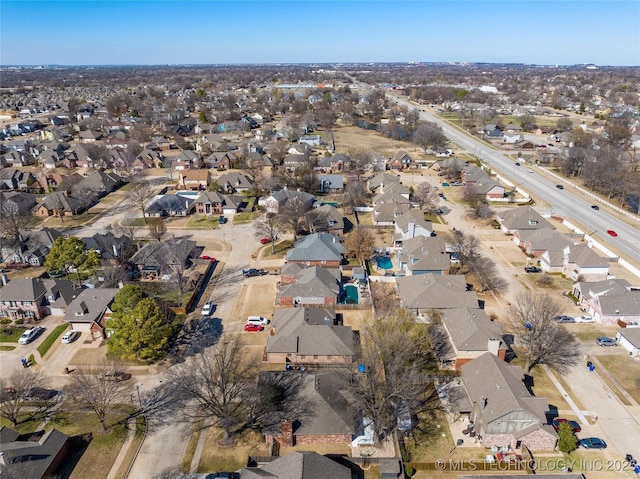 birds eye view of property featuring a residential view