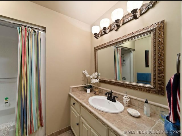33861 S 4507th Rd, Afton, OK 74331 - bathroom with vanity and shower / bathtub combination with curtain