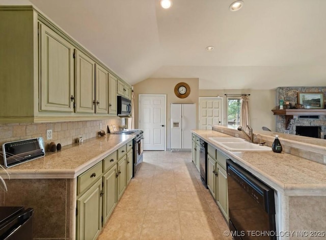 33861 S 4507th Rd, Afton, OK 74331 - kitchen with black appliances, light countertops, a sink, tasteful backsplash, and vaulted ceiling