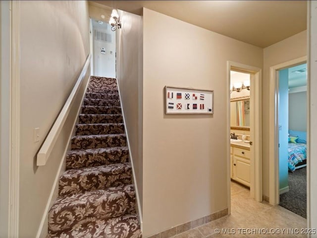 33861 S 4507th Rd, Afton, OK 74331 - stairs featuring carpet floors and baseboards