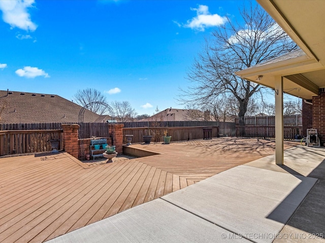 deck featuring a fenced backyard