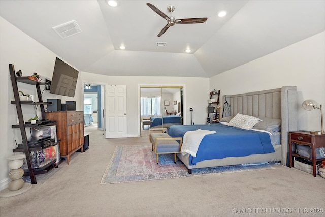 bedroom featuring lofted ceiling, recessed lighting, visible vents, and light carpet