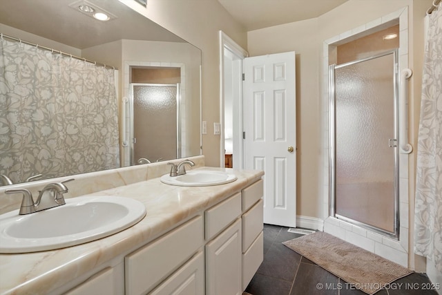 full bathroom with a sink, a shower with curtain, double vanity, and tile patterned floors